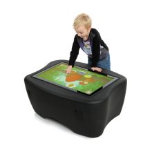 EdTech child Boy playing with interactive screen